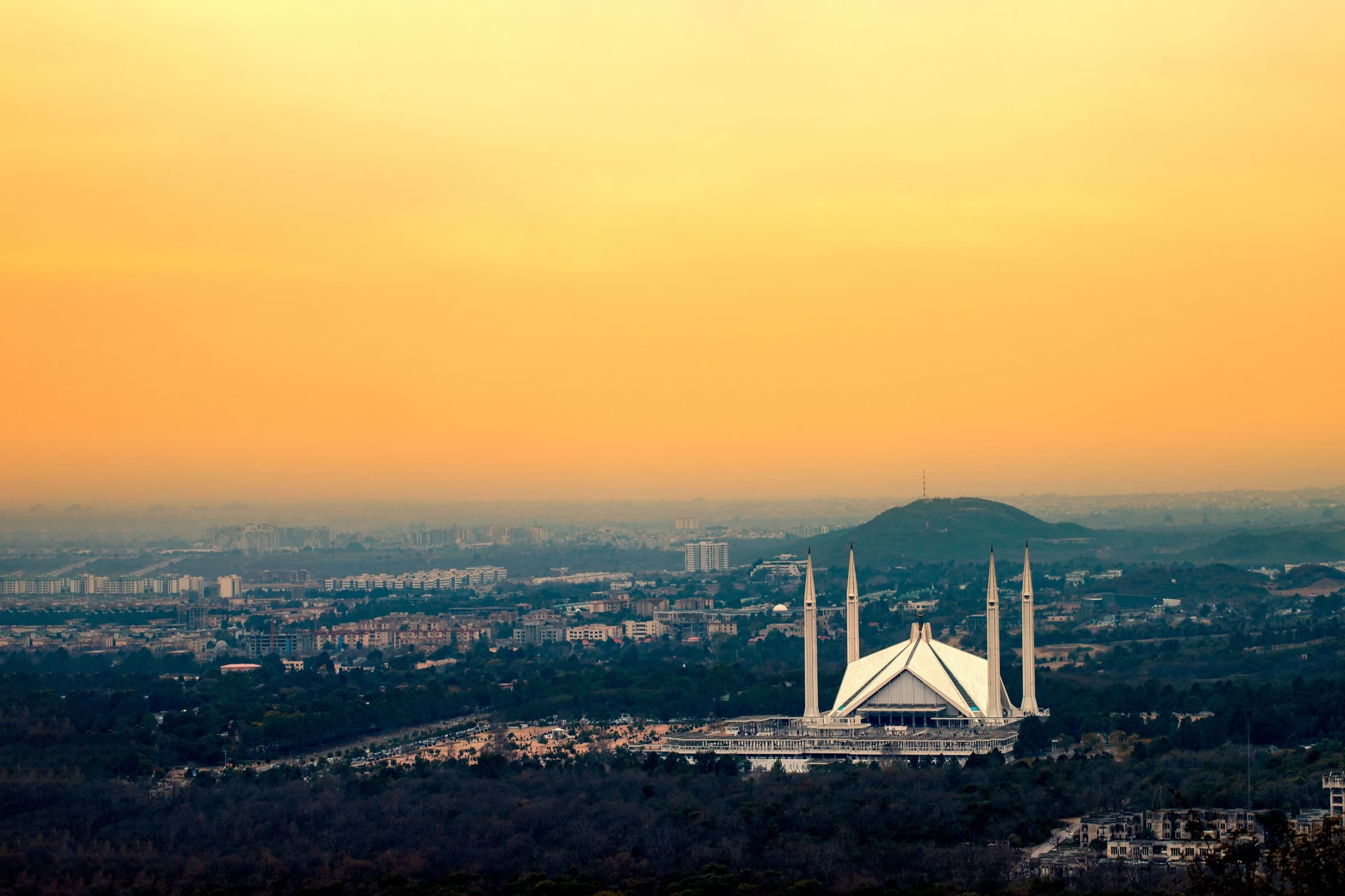 Faisal Mosque beneath a colourful Islamabad sky